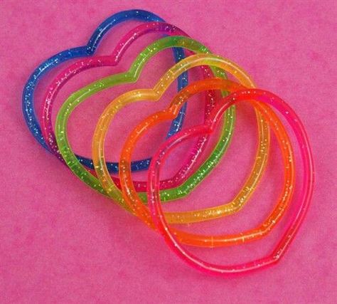 These Heart shaped glitter jelly bracelets could be found at most dime stores or vending machines for a quarter.   G;) Jelly Bracelets, Kidcore Aesthetic, Nostalgia Core, Childhood Memories 2000, 2000s Nostalgia, 2000s Aesthetic, Rainbow Aesthetic, Indie Aesthetic, Kid Core