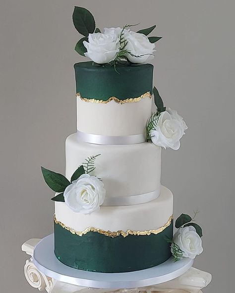 Green and white theme wedding cake | Instagram White And Green Cake Wedding, 3 Tier Wedding Cake Emerald Green, Dark Green And White Wedding Cake, Wedding Cakes Emerald Green And Gold, Emerald And Gold Wedding Cake, Wedding Cake With Emerald Green, Green White Gold Cake, Emerald Green And Gold Wedding Cake, Emerald Green Cake Ideas