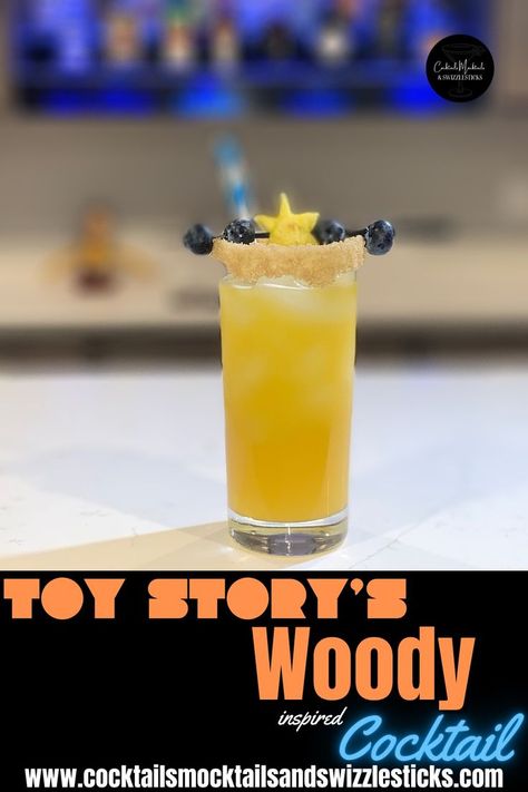 This image shows an orange drink with a brown rim, a star shaped garnish flanked by two blue berries. Toy Story Themed Cocktails, Toy Story Alcohol Drinks, Toy Story Themed Drinks, Toy Story Cocktails, Toy Story Drink Ideas, Toy Story Drinks, Disney Themed Drinks, Infinity And Beyond Birthday Party, Two Infinity And Beyond Birthday