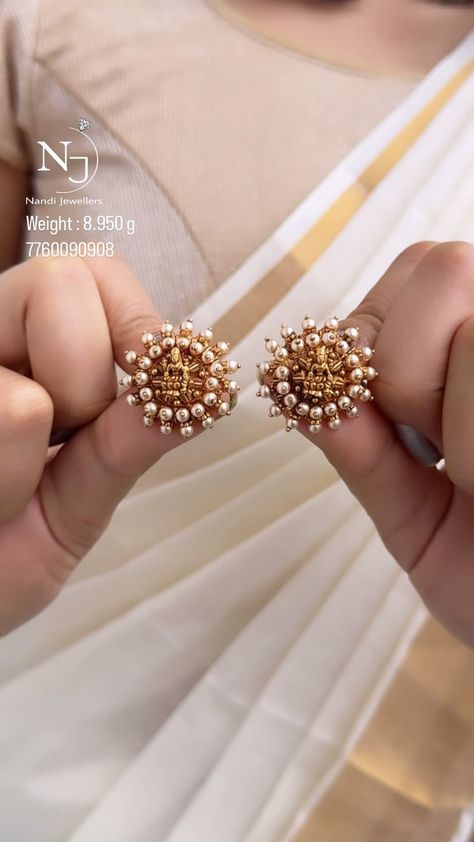 Lakshmi Pearl Ear Studs From 'Nandi Jewels' • South India Jewels Ear Studs Indian, Big Earrings Gold, Latest Earrings Design, Pearl Earrings Designs, New Gold Jewellery Designs, Gold Earrings Models, Diamond Pendants Designs, Gold Earrings Wedding, Hindu Goddess