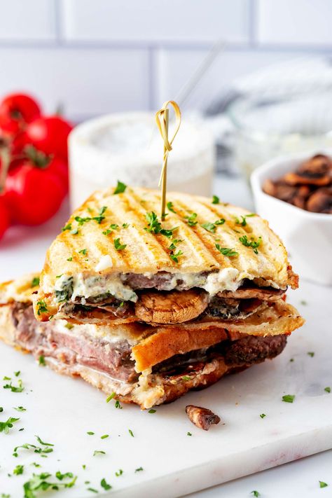 Get ready to sink your teeth into a mouthwatering Roast Beef Panini packed with flavor and grilled to perfection. In just a few minutes, you can whip up this satisfying sandwich that combines tender roast beef, sautéed mushrooms, and a zesty cream cheese spread. We'll use our trusty panini press to achieve that delectable golden crunch on the outside while keeping the inside warm and gooey. This recipe is sure to become a favorite for both lunchtime cravings and family gatherings. Roast Beef Panini Sandwiches, Roast Beef Panini, Best Panini Recipes, Slow Cook Roast, Hot Sandwich Recipes, Tender Roast Beef, Beef Tenderloin Recipes, Roast Beef Sandwich, Sirloin Tip Roast