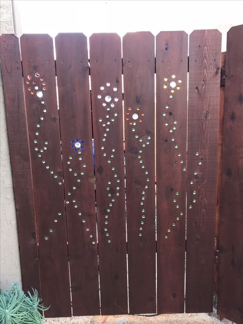 Garden Art Marbles Marble Fence Garden Art, Fence With Marbles In It, Marbled Fence, Fence Cutouts, Creative Fences, Marble Fence, Wellbeing Wednesday, Door Trellis, Marble Ideas