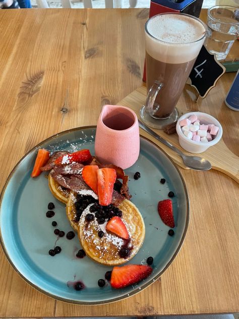 Pancakes with fruits (Strawberries and blueberries) and maple syrup and a hot chocolate drink. #food #foodporn #foodphotography #breakfast #breakfastideas #pancakes #pancakeday #fruit #pinterest #aesthetic #wholesomeyum #heaven Stewed Fruit, Fruit Pancakes, Hot Chocolate Drink, Strawberries And Blueberries, Chocolate Drink, Hot Chocolate Drinks, Forest Fruits, Pancake Day, Breakfast Pancakes