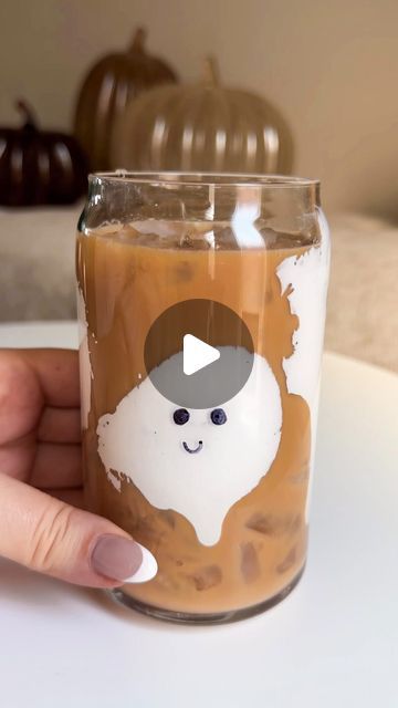 ChampagneAng | Ang Sturino on Instagram: "Ghost iced coffee is a must for #halloweekend 👻🖤☕️ I’d been seeing these little cutie ghosts everywhere and couldn’t resist trying it! It’s also super easy to make for the kiddos by subbing the coffee with chocolate milk. The permanent marker also washes right off with a scrubby   Ghost Ice Coffee: - whipped marshmallow fluff. Use the back of the spoon to press blobs in to clear glass.  - draw on different ghost faces with a permanent marker  - fill with iced coffee or chocolate milk   #halloween2023 #halloweenfood #halloweendrinks #halloweendrink #halloweencoffee #ghostcoffee #ghostbusters #halloweenpartyideas #halloweenpartyfood #halloweenaesthetic #cutehalloween #halloweentreats" Ghost Chocolate Milk, Ghost Milk, Coffee With Chocolate, October Ideas, Ghost Busters, Marshmallow Fluff, Ice Coffee, Halloween Drinks, Halloween Coffee