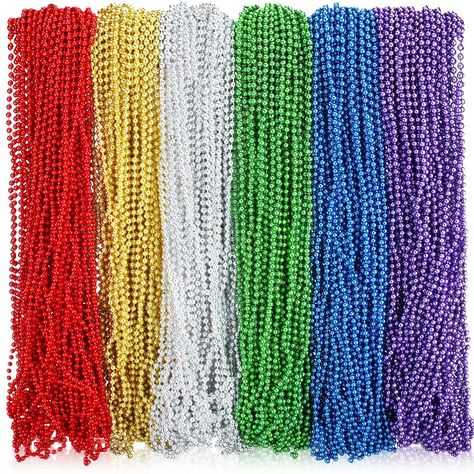 PRICES MAY VARY. Bead Necklaces for Christmas Bulk: you will get 300 items in 6 different colors; 300 pack necklaces can satisfy a big party's decoration, everyone can wear a different necklace combination Christmas Element: our Christmas bead necklaces are designed in red, green, silver, blue, yellow, and purple colors; Basically consistent with the colors of the Christmas, increasing the festival atmosphere and inspiring people's holiday feelings Quality and Serviceable: made of quality colorf Metallic Costume, Christmas Bead Necklace, Xmas Beads, Green Bead Necklace, Festival Atmosphere, Multi Coloured Necklaces, Green Beaded Necklace, Mardi Gras Beads, Christmas Necklace