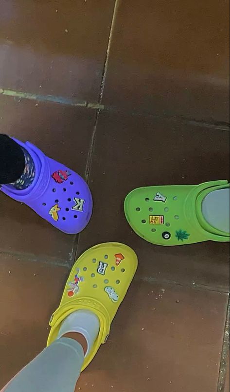 @crocs Yellow crocs| purple crocs| green crocs| jibbitz Green Crocs With Jibbitz, Yellow Crocs With Jibbitz, Pastel Crocs, Green Crocs, Crocs With Jibbitz, Crocs Green, Purple Crocs, Crocs Ideas, Yellow Crocs