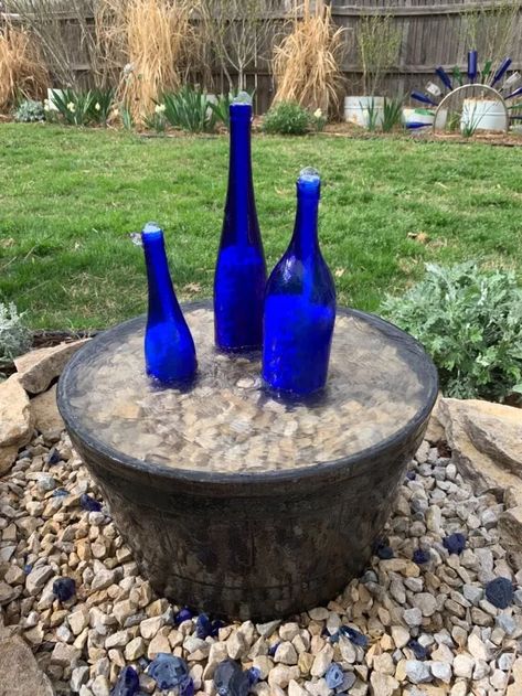 Water Fountain From Wine Bottles | Hometalk Outdoor Water Fountain Ideas, Wine Bottle Fountain, Water Fountain Ideas, Homemade Water Fountains, Small Water Fountain, Concrete Fountains, Fountain Ideas, Diy Water Feature, Old Wine Bottles