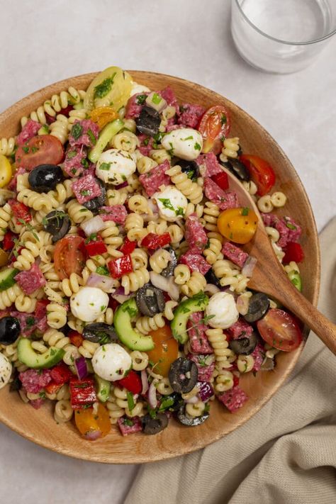 Italian Pasta Salad is one of those recipe that is great for any occasion, especially if your needing to feed a crowd. This delicious recipe is packed with veggies, pasta, salami, cheese, and seasonings to give you a bomb of flavor that will leave you full and satisfied. Veggies Pasta, Asian Ramen, Salami And Cheese, Italian Pasta Salad, Antipasto Salad, Pasta Side Dishes, Pasta Sides, Best Pasta Salad, Cold Pasta Salad