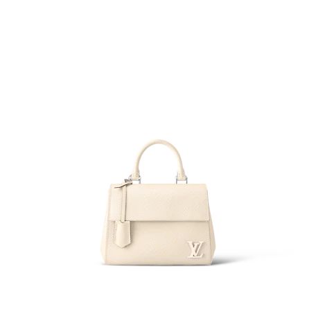 This exclusive Cluny Mini handbag features a reversible jacquard strap: one side displays the Louis Vuitton logo for a statement look; the other shows Monogram Flowers, for a subtle effect. Made from textured Epi leather, the bag also features an LV signature in smooth resin and a contrasting lining. The strap is removable for a more dressed-up allure. Louis Vuitton Cluny, Louis Vuitton Logo, Handbags Louis Vuitton, Cross Body Bags, Mini Handbag, Louis Vuitton Official, Mini Handbags, Cowhide Leather, Women Collection