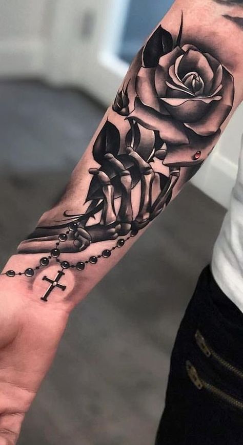 << Check out more Skeleton Hand Tattoos and Ideas #tattoomenow #tattooideas #tattoodesigns #tattoos #skeletonhand #skeleton #rose Men Hand Tattoos, Skeleton Hand Tattoos, Tattoos 2023, Skull Rose Tattoos, Skull Hand Tattoo, Inner Forearm Tattoo, Rose Tattoos For Men, Cross Tattoos For Women, Realistic Tattoo Sleeve