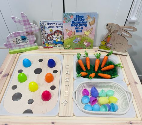 All about Easter today!!! 🐰 Our Easter themed Flisat set up today with our circle activity board. So many ways to encourage play with our flisat activity lids. I’m always switching up activities in my daycare space and for my own toddler. Have you picked one up yet? Our Circle Board is $27 (Trofast Bin available for table top activities at additional cost) Our activity table is coming 🔜… Copyright © 2022 Littlebeandiscoveries Easter Flisat Table, Table Top Activities, Circle Activity, Ikea Flisat Table, Daycare Spaces, Table Activities, Flisat Table, Toddler Sensory Bins, Ikea Flisat