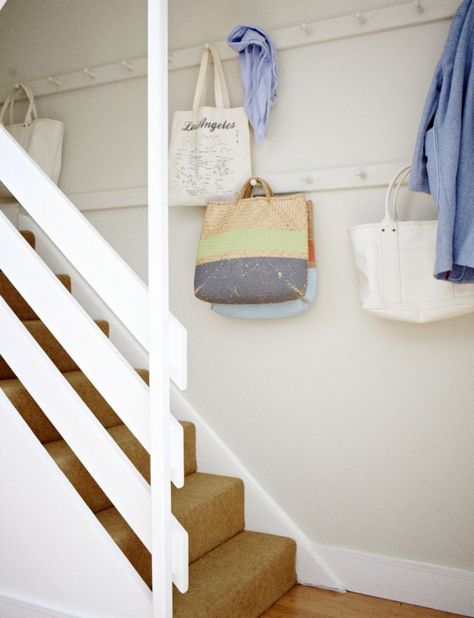 Stairway Storage, Basement Stairway, Basement Stairwell, Stairway Wall, Shaker Pegs, Stair Wall, London Townhouse, Basement Stairs, Hobbit Hole