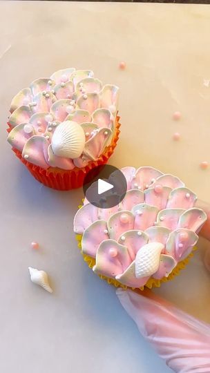 Cupcake Decorating Idea: make magical mermaid cupcakes 🧜‍♀️🧁 like @ SugarCloud.Biz on Instagram using layered two-tone buttercream with petal piping tip 104, Wilton Sugar Pearls, and a fondant shell. What color would your mermaid-inspirated treats be? | Wilton Cake Decorating | Giulio Cercato · Seaside (Instrumental) Petal Piping Tip, Piping Tip, Mermaid Cupcakes, Bakers Gonna Bake, Wilton Cake Decorating, Wilton Cakes, Cupcake Decorating, Piping Tips, Buttercream Frosting