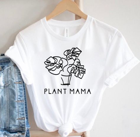 Plant Mama Monstera  ShirtPlease use the measurements chart in the pictures section to determine your correct size.Care Instructions:Wash inside out in warm water, gentle cycle, tumble or line dry. Do not iron on vinyl.https://www.etsy.com/shop/ModishChicBoutique?ref=seller-platform-mcnavIf you have any questions, please contact me and I will be happy to answer.Please note that due to lighting effects, monitor's brightness, contrast and other settings, there might be some slight differences in t Birthday Squad Shirts, Disney Couple Shirts, Garden Shirt, Plant Mama, Measurements Chart, Crazy Plant Lady, Girls Trip Shirts, Christmas Party Shirts, Gardening Shirts