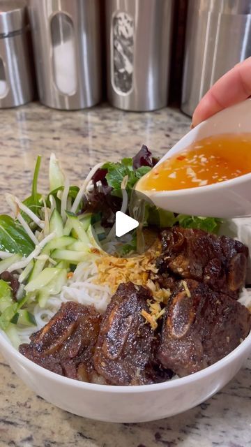 Joedy Tran on Instagram: "BÚN THỊT NƯỚNG 
GRILLED LEMONGRASS BEEF SHORT RIBS VERMICELLI NOODLE BOWL 
Simple but delicious 😋 
Marinade the meat with 1 cup of my all purpose marinate. Recipe pinned on the reels section. If you don’t have it. Here’s one from scratch 
Recipe:
• 2-3 lbs beef short ribs 
• 1/4cup fish sauce (3 crabs 🦀)
• 3 tablespoon light soy sauce 
• 2 tablespoon minced garlic 
• 1/4 cup chopped green onion (optional)
• 1/4 cup finely chopped lemon grass (more if prefer)
• 2 tablespoon cooking oil 
• 3 tablespoon sugar 
• 2 tablespoon honey 
• 1 teaspoon msg (optional)
• 1 teaspoon ground pepper 
Mix well until sugar dissolved. Marinate for 2-3 hrs. or overnight in the refrigerator. 
Scroll back a post for the dipping sauce video recipe. 
 
😉#nuocmamafoods #vietnamesefood # Marinate Recipe, Vermicelli Noodle Bowl, Lemongrass Beef, Sauce Video, Garlic Chicken Pasta, Vietnamese Noodles, Vermicelli Noodles, Asian Foods, Beef Short Ribs