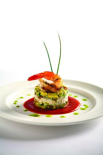 Our chilled Gulf shrimp with jumbo lump crab layered with fresh diced avocado and local tomato, and finished with a spicy tomato coulis, is one of our delicious signature appetizers served at Criollo Restaurant & Lounge. Gastronomic Food, Fine Dining Plating, Gourmet Food Plating, Food Plating Techniques, Shrimp Appetizers, Fine Dining Recipes, Constant Contact, Food Garnishes, Blue Crab