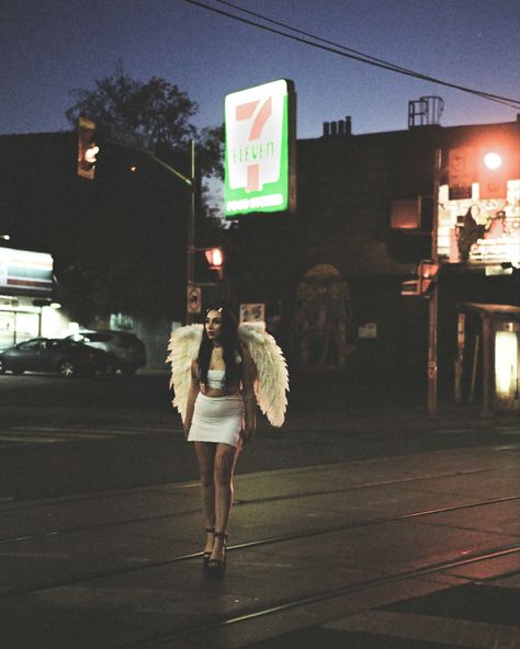 #toronto #filmphotography #filmisnotdead #angel #fallenangel #wings #girl #aesthetic #highheels #allwhiteclothes #homemade #cosplay #halloween #halloweenmakeup #halloweencostumeswomen #angelcore #lanadelreyaesthetic #longnails #styling #photoshoot #earthamk #artist #street #streetphotography #night #citystreet #lighting #nightphotography #dark #darkart #darkacademia #darkacademiaaesthetic #animeaesthetic #gothgirl #seveneleven #ossington #moodboard Homemade Cosplay, Angel Wings Photography, Styling Photoshoot, Angel Aesthetic, Fall From Grace, Halloween Photoshoot, Model Drawing, Cosplay Halloween, Halloween Photos