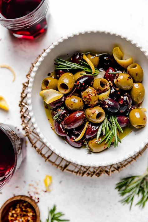 This easy marinated olives recipe from our friend, Plays Well With Butter combines a delicious blend of olives with olive oil. Olive Recipe, Olives Recipes, Easy Holiday Snacks, Greek Olive Oil, Salad Appetizer Cups, Appetizer Cups, Salads For Parties, Marinated Olives, Olive Oil Recipes