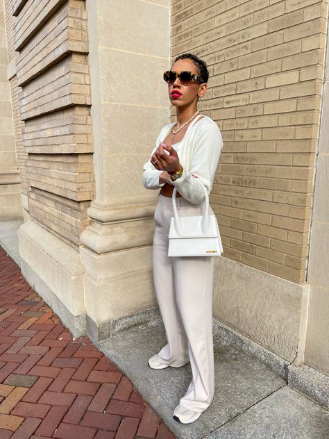 All white classy outifits always make me feel like im in my soft life aesthetic. Its giving black girl luxury! Ive styles a white sweater crop set with cream oversized trousers, new balance 530s, le grande Chiquito jacquemus bag and off white tortoiseshell sunglasses. Oh and you can’t forget the red lip! White Jacquemus Bag Outfit, White Jacquemus Bag, Jacquemus Bag Outfit, Le Grand Chiquito, Soft Life Aesthetic, Oversized Trousers, Tortoiseshell Sunglasses, Jacquemus Bag, Soft Life