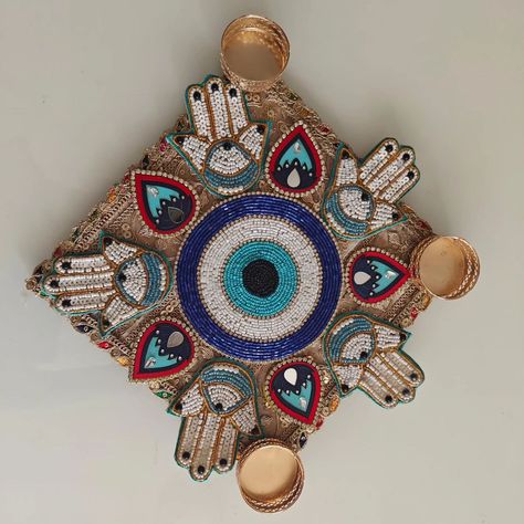 Evil eye ,Hamza Rangoli on a mdf base of 8*8 DM us for more details or WhatsApp us on 9867422790 Evil Eye, On Instagram, Quick Saves, Instagram