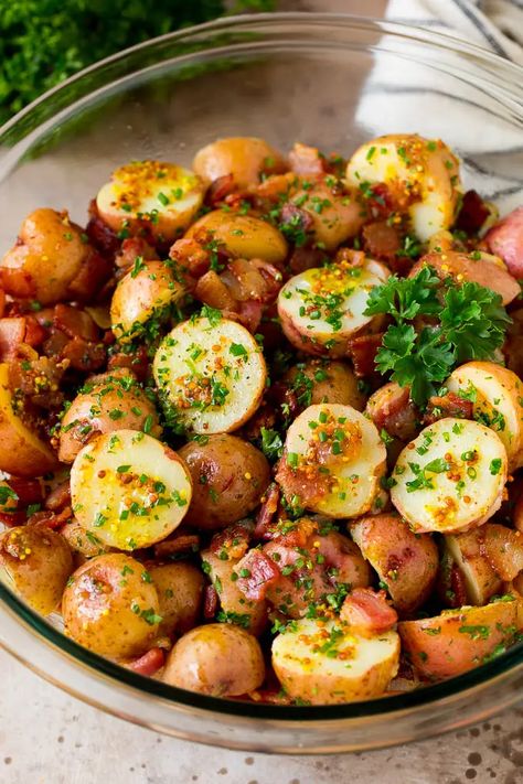 This German potato salad is boiled baby potatoes tossed in a warm bacon and mustard dressing, then garnished with fresh herbs. Potato Salad Bites, Boiled Red Potatoes, Baby Potato Salad, Boiled Baby Potatoes, American Potato Salad, German Potato Salad Recipe, Baby Potato, German Potato, German Potatoes