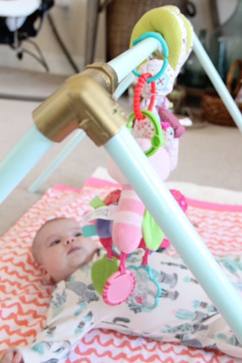 DIY Baby Activity Gym | Home On Oak Diy Baby Gym, Baby Gym Mat, Baby Activity Gym, Baby Gym Toys, Diy Gym, Baby Play Gym, Pvc Pipe Projects, Gym Mat, Baby Toys Diy