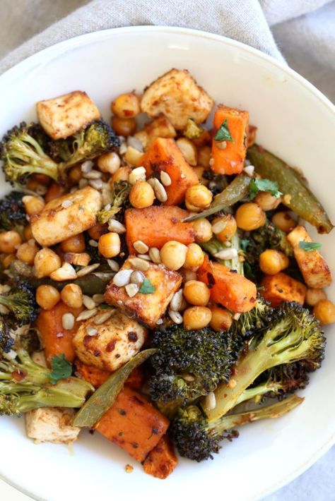 Sheet Pan Veggie Dinner with Broccoli, Sweet Potato, Tofu, Chickpeas, Sunflower seeds dressed with Miso Maple Dressing. #Vegan #Glutenfree #Nutfree #Recipe. Can be #soyfree with chickpea miso #VeganRicha Dinner With Broccoli, Sweet Potato Tofu, Broccoli Sweet Potato, Maple Dressing, Vegan Recipes Beginner, Veggie Dinner, Idee Pasto Sano, Vegetarian Dinner, Meatless Meals