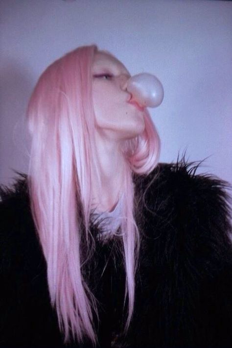 Girl with pink hair blowing a bubble with pink bubblegum Blowing Bubble Gum Aesthetic, Gum Photoshoot, Bubble Gum Hair, Bubble Gum Aesthetic, Bubble Gum Pink Hair, Girl Blowing Bubble Gum, Bubblegum Blowing, Scary Mansion, Bubblegum Aesthetic