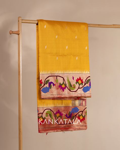 The elegant peacocks, parrots, and floral designs are intricately weave into a small tissue base border on both sides of the saree. Enhanced by rich gold zari polka dot butta all over the body, it becomes an ideal choice for weddings and festive celebrations. 

The significance of a Paithani saree is truly vast and very interesting, and so is this gem of a saree that we present to you.

Product Code:- 1213727804 Yellow Paithani Saree, Paithani Saree Wedding, Yellow Paithani, Long Gown Design, Paithani Saree, Indian Wedding Outfit, Paithani Sarees, Product Shoot, Yellow Saree