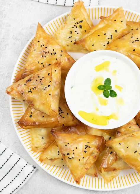 Once you introduce Sambousek With Cheese (Samosa) to your party table, every party will feel incomplete without this baked healthy Samosa. Cheese Sambousek, Cheese Samosa, Samosas Recipe, Samosa Recipe, Filo Pastry, White Cheese, Casual Dining Restaurant, Flaky Pastry, Puff Pastry Recipes