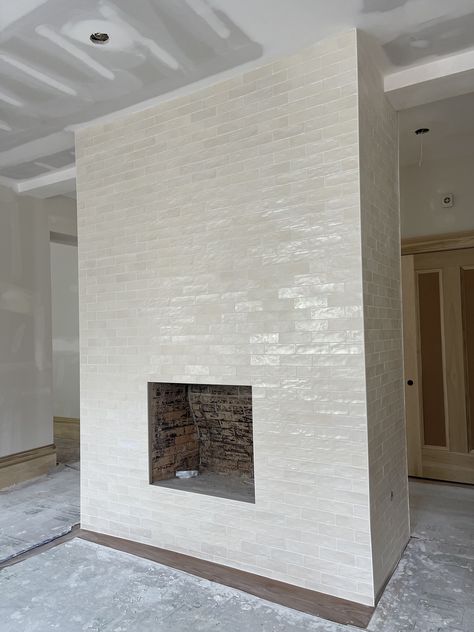 Beige Fireplace Tile, Brick Fireplace Transformation, Beige Tile Fireplace, White Tile Fireplace Ideas, White Tile Fireplace Surround, 2023 Fireplace, Beige Fireplace, Charleston Kitchen, Tiled Fireplace Wall