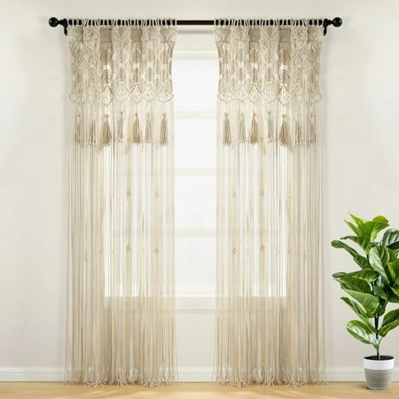 Welcome some relaxing elements of the bohemian style wherever you hang this stylish Boho Macrame Tassel Cotton Window Curtain. Detailed with large hanging tassels, this handcrafted panel is woven with 100% cotton. The versatility of this decorative curtain allows you to use this item as a window or doorway curtain, room divider, photo backdrop or as wall art. Macrame home decor is always on trend. The unique design and texture of this Boho Macrame Tassel Cotton Window Curtain make it easy to see Macrame Tassel, Hanging Tassels, Neutral Curtains, Macrame Home Decor, Doorway Curtain, Curtain Room, Tassel Curtains, Lush Decor, Macrame Curtain