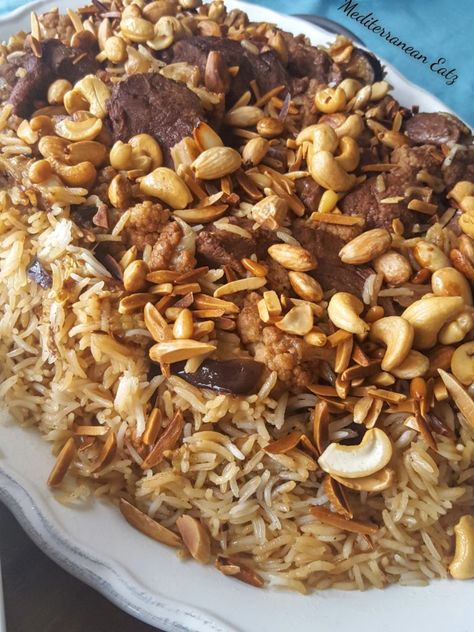 Makloube (Spiced Upside-Down Rice Dish) - Mediterranean Eatz Kashmiri Culture, East Recipes, Arab Food, Lebanese Desserts, Middle East Recipes, Arabic Recipes, Spiced Rice, Family Dishes, Lebanese Cuisine