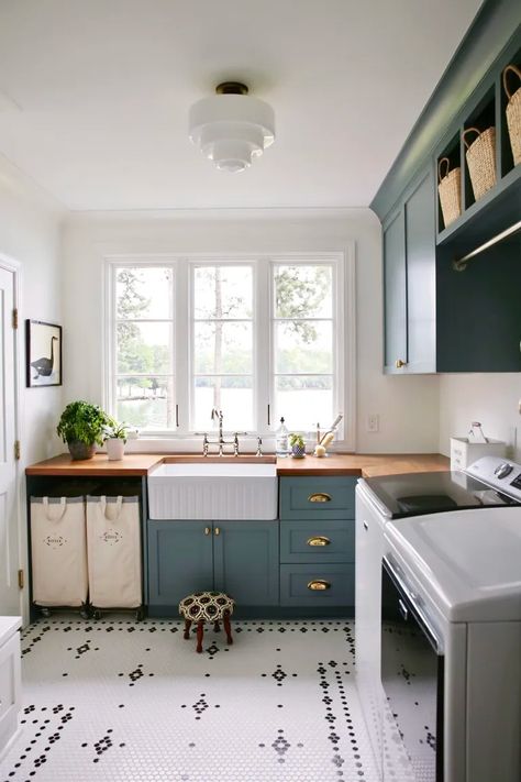 IKEA laundry room hacks for a stylish space on a budget | Livingetc Colonial Laundry Room, Big Laundry Room Ideas, Laundry Room Island, Sektion Cabinets, Ikea Laundry, Ikea Sektion Cabinets, Built In Cubbies, Ikea Laundry Room, Ikea Sektion