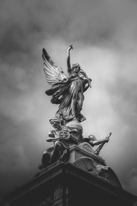 Winged Victory I The Queen Victoria Memorial is located in front of Buckingham Palace Winged Victory Of Samothrace, Victoria Memorial, Winged Victory, Statue Tattoo, Memorial Statues, Black And White Theme, Queen Victoria, Black N White, Buckingham Palace