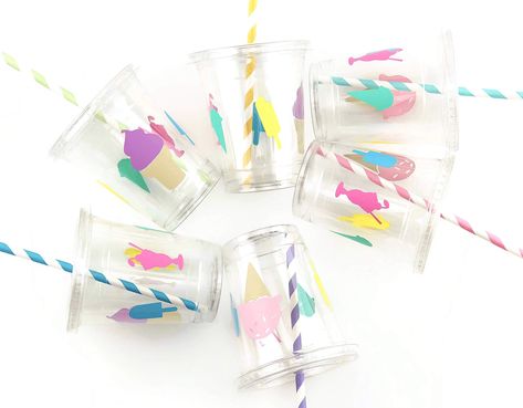 PRICES MAY VARY. 12 Count clear soft plastic disposable 12 oz cups with vinyl decals; includes lids and straws Each plastic cup has 5 decals in a variety of ice cream and popsicle designs Colors include lavender, mint, blue, bright pink, yellow and pastel pink Serve with your favorite drink, or fill with treats and candies for a party favor keepsake Serve drinks in these adorable ice cream party cups! Each set includes 12 clear soft plastic 12 oz disposable drinking cups with handmade vinyl deca Popsicle Party, Simple Birthday Party, Birthday Party Cups, Donut Bar, Sprinkle Party, Ice Cream Birthday Party, Ice Cream Theme, Sweet Party, Printable Ideas