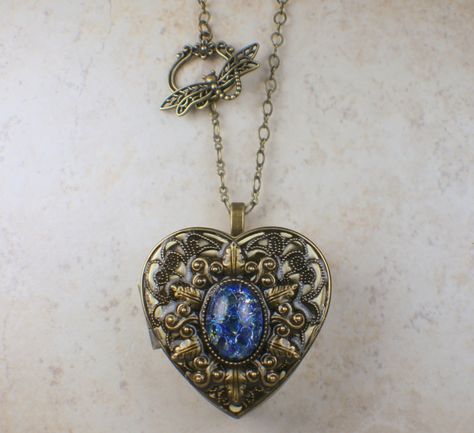 🎶 Unlock your inner melodies with our stunning Sapphire Blue Opal Music Box Locket! 🎵 This exquisite piece is now available for only $100.00 💙✨ Don't miss out on the chance to add this unique locket to your collection 🌟 #musicbox #jewelry #locket #sapphireblue #opal #melodies #accessories #fashion #limitededition #musthave #sale Shop Now https://bit.ly/3xA0KSg Music Box Necklace, Music Box Locket, Unique Locket, Heart Music, Music Box Jewelry, Oil Free Moisturizers, Photo Locket, Necklace Box, Heart Locket