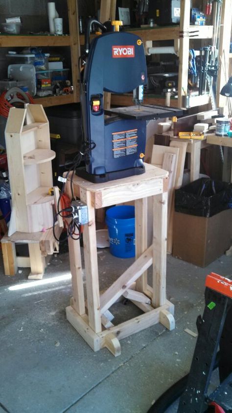 At long last I was feeling well enough to strap on the back brace and tinker in the shop.  First order of business was to get the band saw base finished so I could move the band saw off the bench a… Band Saw Stand Diy, Band Saw Stand, Bandsaw Stand, Wood Jig, Table Saw Stand, Diy Table Saw, Saw Stand, Tool Stands, Baby Room Diy