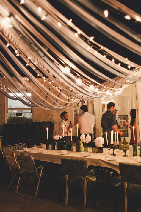 decor featuring a canopy made of lace ribbons and lights, emptied various wine/brown/green bottles, tablecloth from fabric/ and DIY tissue paper flowers// photography by @sarah Wedding Canopy Decorations, Hollywood Dance, Racing Theme, Graduation Dinner, Exhibition Ideas, Canopy Architecture, 20s Party, Wedding Aesthetics, Prom 2014