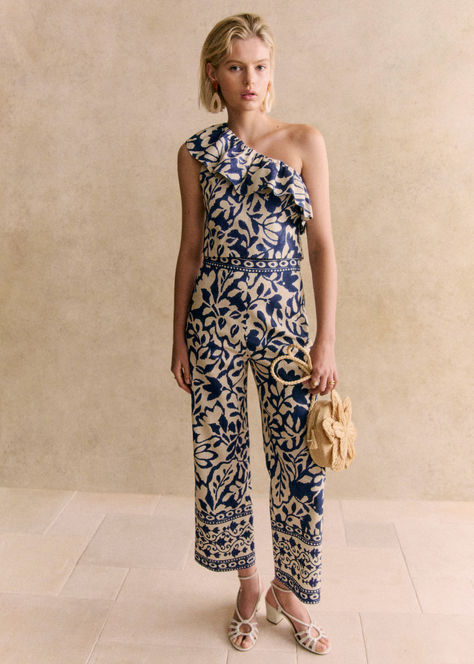 Introducing the Sézane Dari Blouse and Jenson Trousers, part of an exclusive collaboration with Momonì. The one shoulder blouse, adorned with a blue and white large floral print, features a gathered ruffle neckline and side zip. Paired with the high-waisted, wide-leg Jenson Trousers in matching print, this co-ord set is perfect for a chic, early summer look. Embrace Parisian style and add this vibrant ensemble to your summer capsule wardrobe. Check out all our latest arrivals at sezane.com. White Co Ord Set, Denim Sweatshirt, Fancy Dress Up, Large Floral Print, Summer Capsule, Summer Capsule Wardrobe, Printed Trousers, Linen Trousers, Co Ord Set