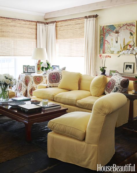 You don't have to switch up every room to achieve major impact. Hamptons Cottage, Table Skirts, Sunny Disposition, Hamptons Summer, Cottage Decor Living Room, Yellow Sofa, Small Living Room Design, Yellow Living Room, Designer Living