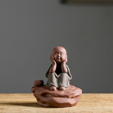 Feature: Material: Made of ceramic, hand crafted, delicate details.Smooth and well made feel. Tea Pet: Ideal for the decoration of the tea ceremony, the collectiong will get more and more smooth and delicate after the tea poured on for a long time. Unique Display: Those statue will definitely bring you good mood when you see it. This Peaceful Buddha gives a sense of calmness and serenity. He brings joy and happiness as well good luck into your life. Application scope: Living room, bedroom, study Hotel Library, Tea Pet, Buddha Statues, Desk Decoration, Ceramic Hand, Brings Joy, Unique Display, Yoga Room, Bedroom Study