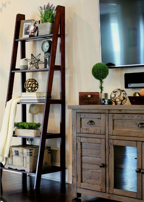 Ladder Bookshelf Decor Bedroom, Tiered Ladder Shelf Decor, Styling Ladder Bookshelves, Decorate A Ladder Shelf, Farmhouse Ladder Shelf Decor, Decorate A Ladder, How To Decorate A Ladder, Ladder Shelf Decor Living Room, Shelf In Living Room