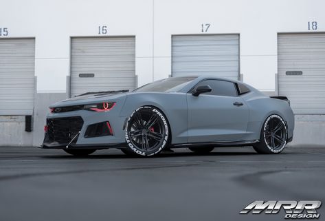 Matte Gray Chevy Camaro Goes Sinister with Custom Red Halo Headlights Camaro Wrap Ideas, Matte Gray Car, Matte Grey Car, Grey Camaro, 2023 Camaro, Car Necessities, 2015 Chevy Camaro, October Goals, Chevy Camaro 1967