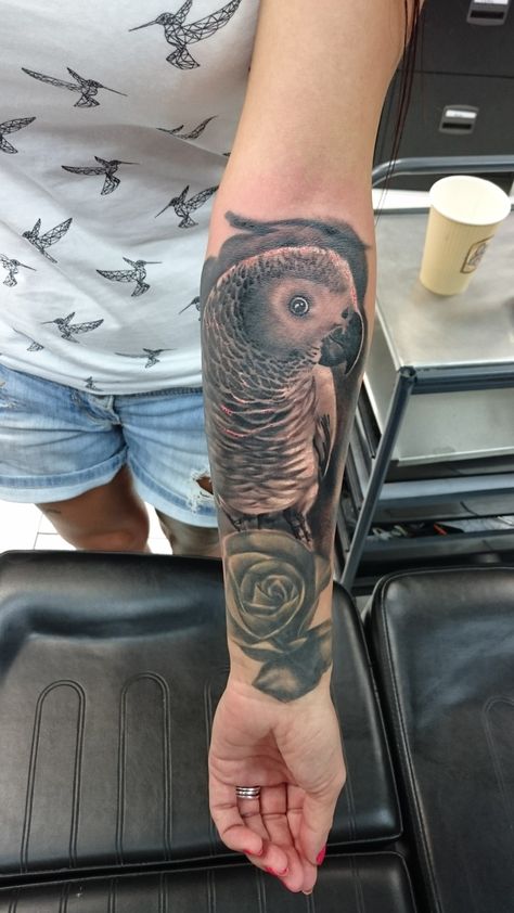 African grey parrot tattoo Realistic black and grey tattoo #africangreytattoo #parrottattoo #realisticparrottattoo #tattoo #blackandgreytattoo #realistictattoo Time Clock Tattoo, Unique Semicolon, Small Symbol Tattoos, Parrot Tattoo, Girl Shoulder Tattoos, Fresh Nail, Geometric Sleeve Tattoo, Tiger Tattoo Design, Semicolon Tattoo