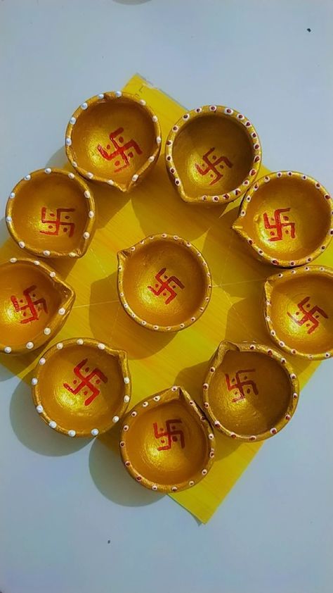 Hand painted Diya for diwali #easy Painted Diya, Diy Diwali Lanterns, Barbie Furniture Tutorial, Diwali Painting, Diya Designs, Diya Decoration Ideas, Diwali Diya Decoration, Diya Decoration, Diwali Decorations At Home