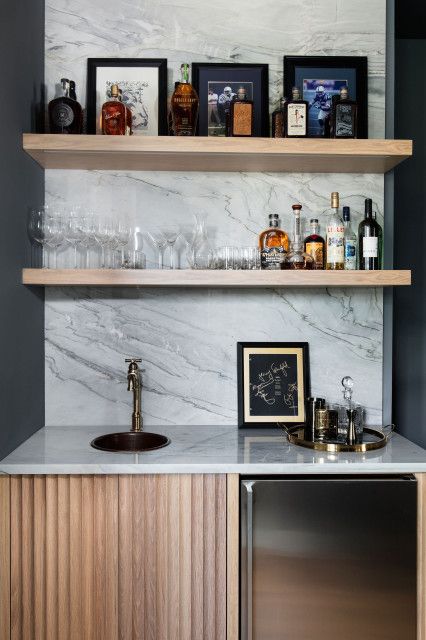 Bar With Floating Shelves, Modern Breakfast Nook, Bar Design Ideas, Taupe Walls, Open Family Room, Home Bar Design, Acrylic Cabinets, Home Bars, Island Countertops