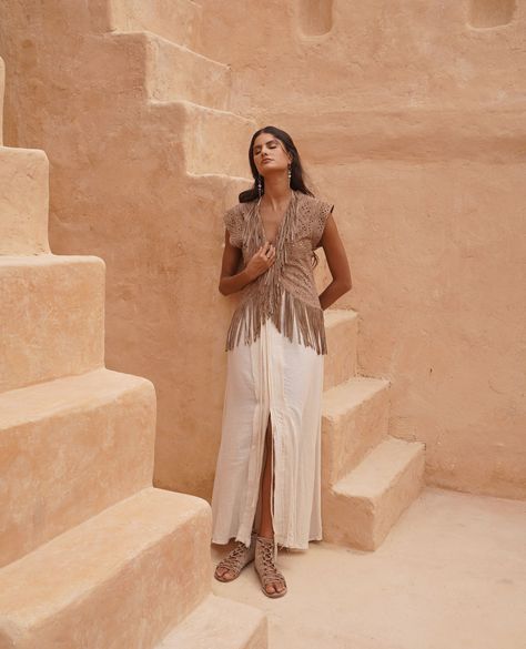 Step into the world of Desert Dreamer, where the vast beauty of the desert inspires every design. Let these boho luxe pieces guide you on your journey of self-expression.⁠
⁠
⁠
⁠
Model wears ⁠Desert Dreamer Vest in Taupe.⁠
⁠
⁠
Photographer @viviansungg⁠
Art & Style Direction @maycortazzi⁠
Videographer @vincentiuslimawan⁠
Hair & Makeup @kseniia_mua⁠
Model @lovebalistarz ⁠
Location @baliartsdistrict⁠
Dress @miabaliofficial⁠
⁠ Desert Dreamer, Boho Luxe, The Desert, Art Style, Hair Makeup, Photographer, Makeup, The World, Hair