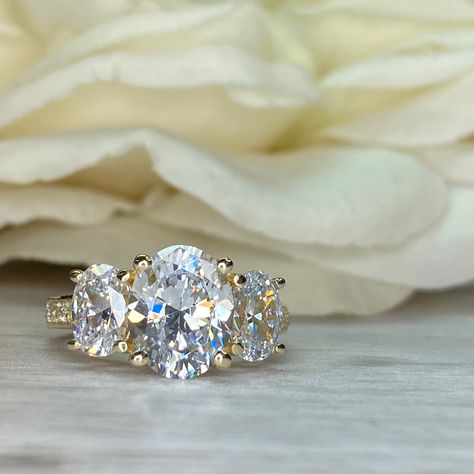 Three Stone Ring Settings, April Birthstone Ring, Ring Photography, Pear Shaped Engagement Rings, Three Stone Engagement Ring, Moissanite Engagement Ring Oval, Yellow Gold Wedding Ring, Oval Engagement, Engagement Ring Shapes