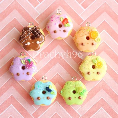 Hi everyone!  Here are some more donut charms I made! These ones are for my own collection this time  I really love how these turned out  together they all look so bright and colourful! Each one has an icing colour corresponding to the fruit. The flavours are strawberry  orange  lemon  lime  blueberry  grape  and there's also a cheeky chocolate one there too  For an extra touch of decoration I added some glitter to the icing as well which I think turned out super prett... Lime Blueberry, Fimo Kawaii, Crea Fimo, Diy Fimo, Kawaii Charms, Polymer Clay Kawaii, Fimo Polymer Clay, Polymer Clay Figures, Polymer Clay Diy